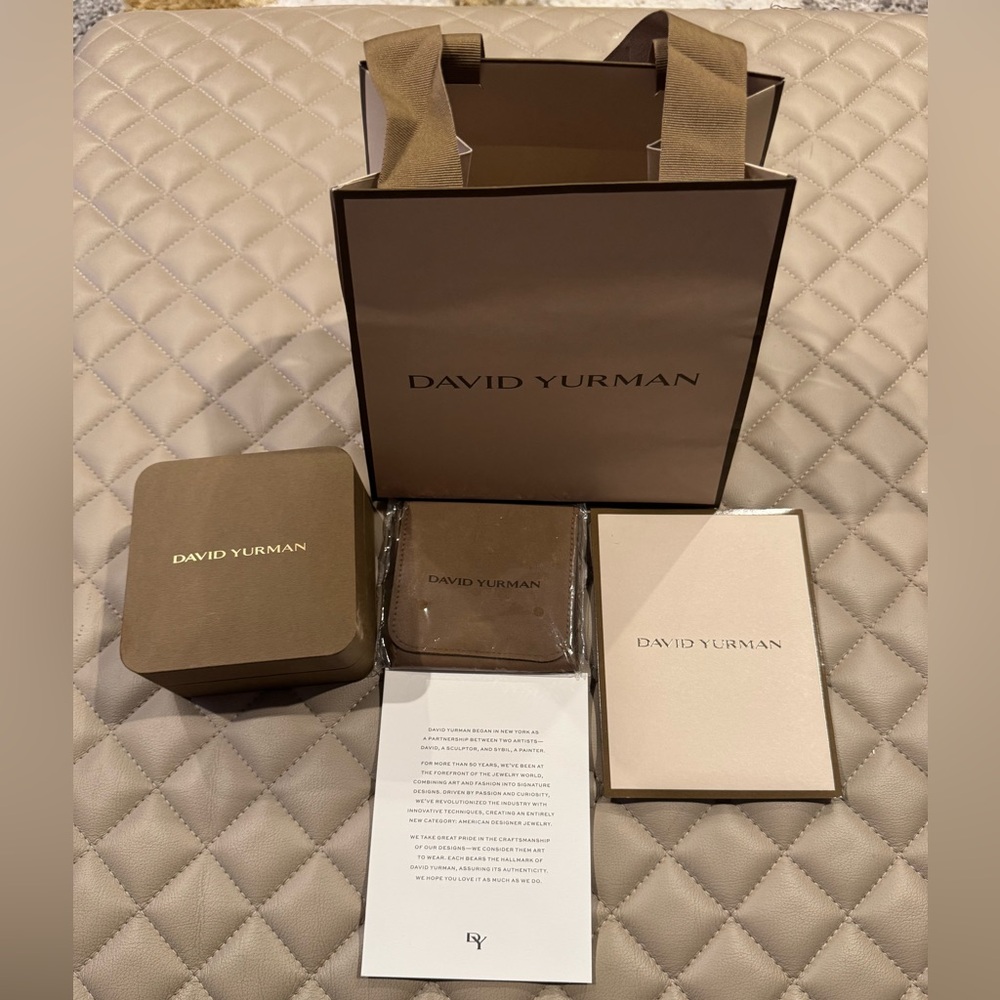 David Yurman shopping bag, carton box, velvet jewelry sleeve, a card.